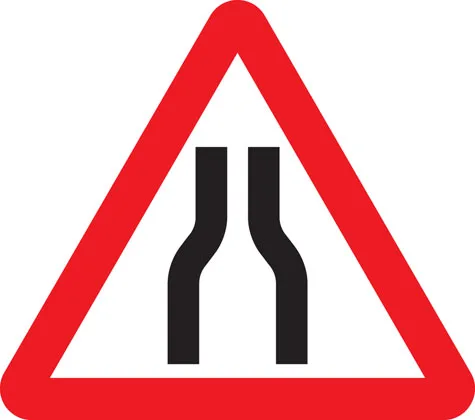 Road narrows on both sides